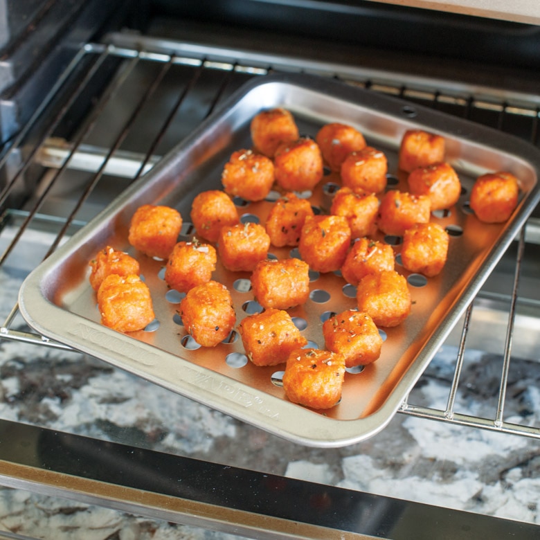 NordicWare - Naturals® Compact Ovenware Muffin Pan – Kitchen Store & More