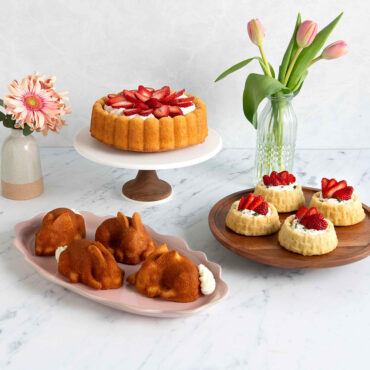 Group shot of Shortcake Baskets Cakes with sliced Strawberries, Charlotte Cake with Sliced Strawberries, and Baby Bunny Cakelets