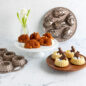 Group shot of shortcake Basket cakes with chocolate bunnies and shortcake Pan, Baby Bunny Cakelets and Pan