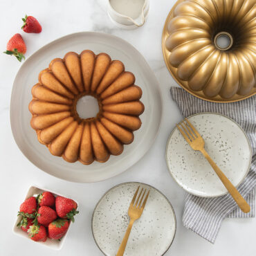 Baked Elegant Party Bundt cake with Bundt Pan in background