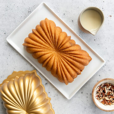 Baked Fluted Loaf Cake using mix with pan in background