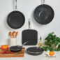 Image of Basalt 5 Piece set displayed on countertop with ingredients and utensils