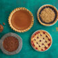 Baked pie group image showing 4 different flavors and sizes