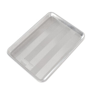 Nordic Ware Prism Jelly Roll Pan with white background. 