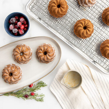 Pirouette Bundtlettes on plate and starburst half sheet with cooling grid