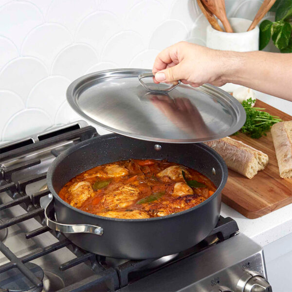 Braiser Pan on stove top with chicken stew
